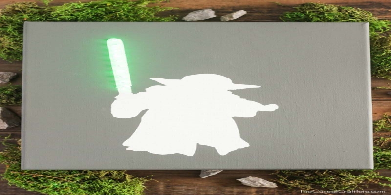 Yoda Canvas Art with Lighted Green Lightsaber 