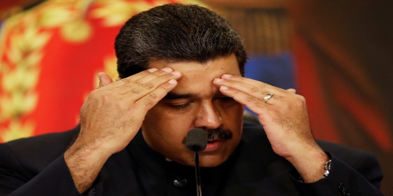 Venezuela’s President Nicolas Maduro gestures as he talks to the media during a news conference at Miraflores Palace in Caracas